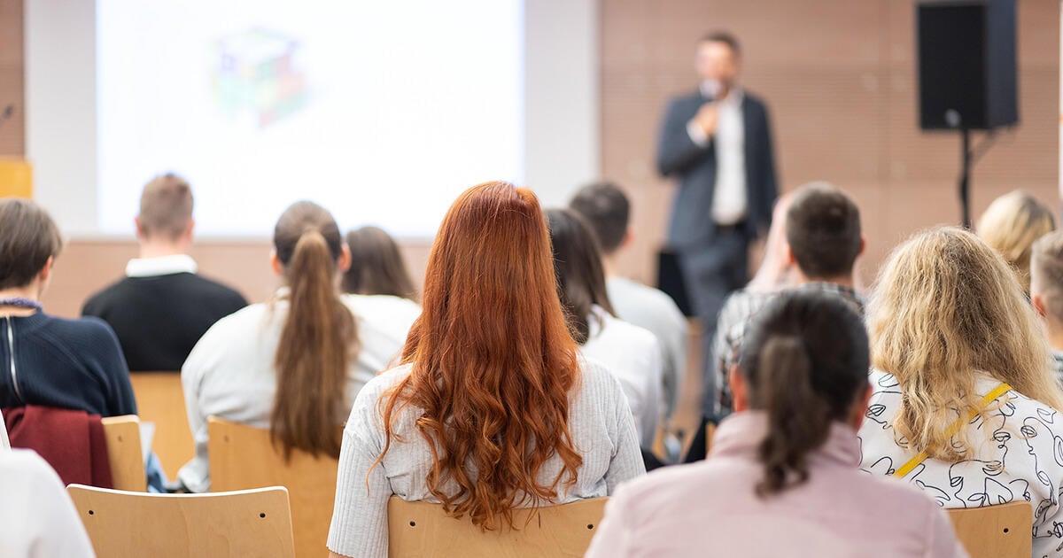 bs-Speaker-Giving-A-Talk-In-Confe-465673545-1200x630